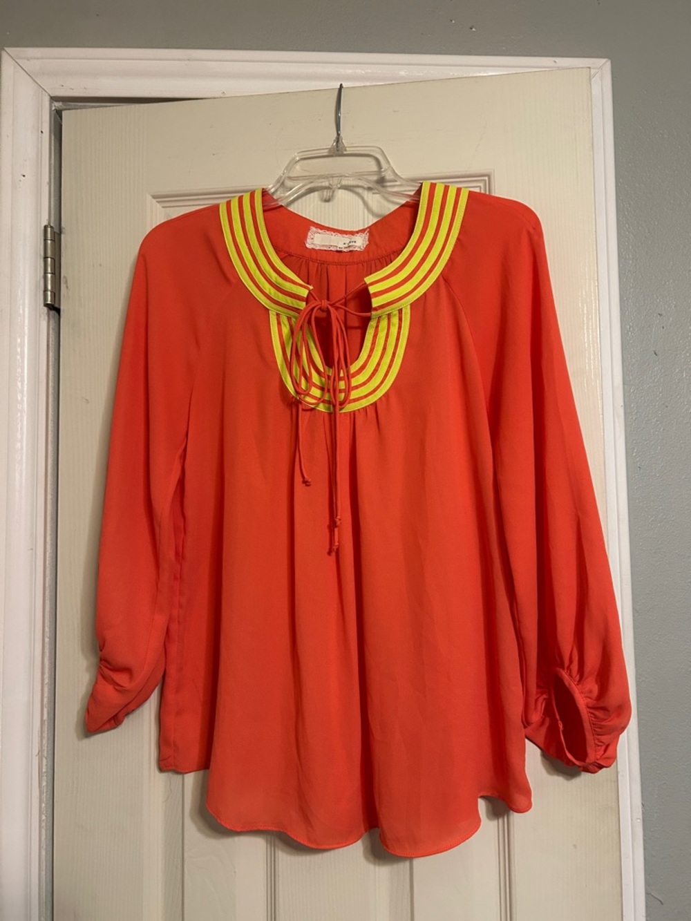 A’reve orange tie neck blouse